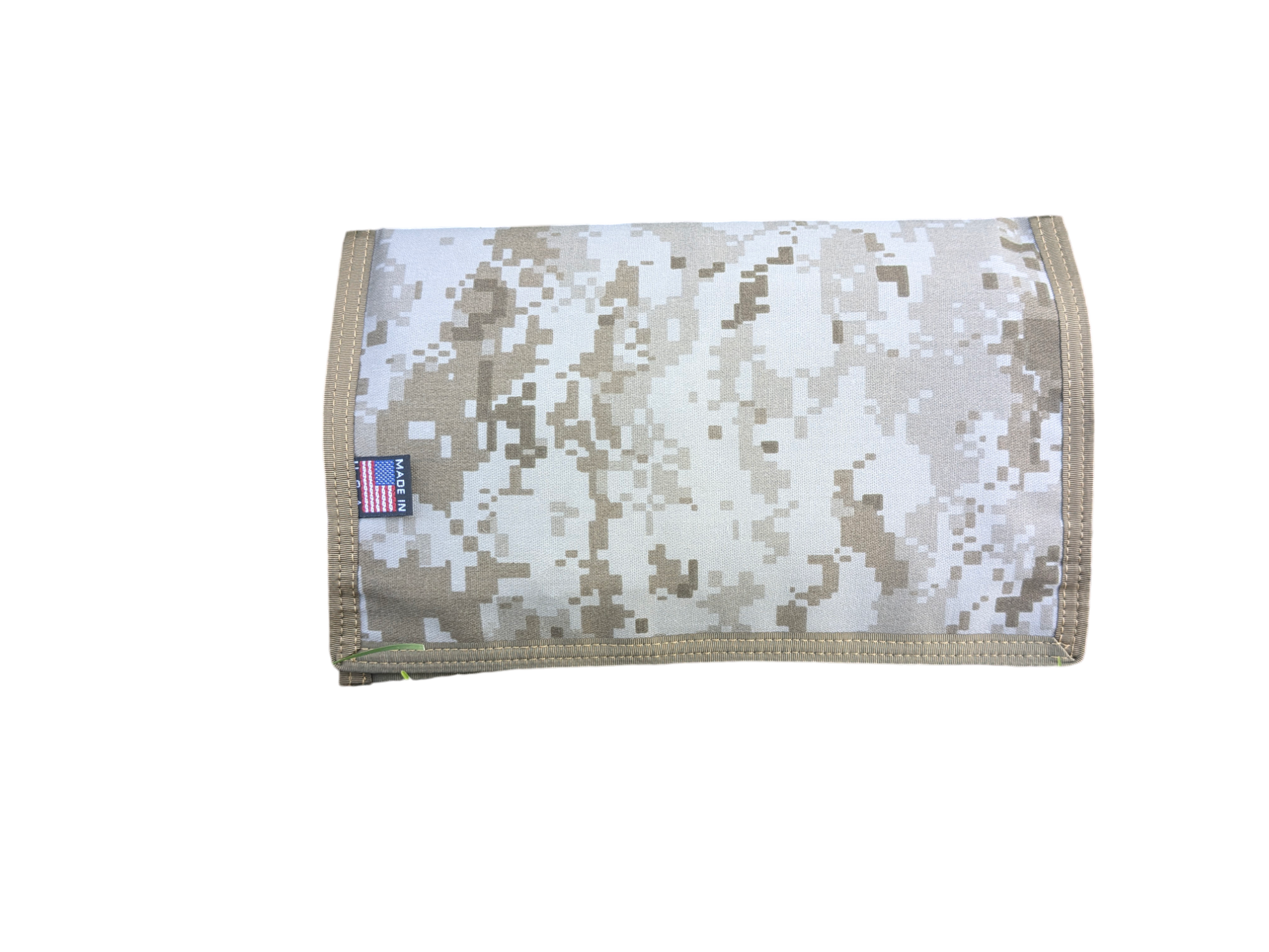 The Six Gun Surplus Map Case "RECCE pouch," featuring a beige and brown camouflage pattern with a small American flag tag, is displayed against a black background. This rectangular pouch includes a neatly stitched flap folded over the front, making it perfect for adventurous gear.