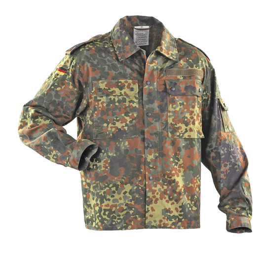 The image shows a Six Gun Surplus German Bundeswehr Flecktarn Field Shirt with a woodland camouflage pattern featuring shades of green, brown, and black. The German army issue jacket has long sleeves, several large front pockets, button closures, and a flag patch on the shoulder. It appears designed for tactical use.
