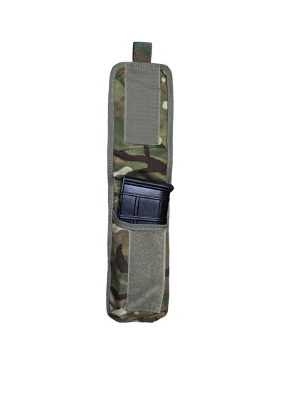 A Six Gun Surplus British MTP Single Rifle Magazine Pouch with a velcro closure strap, containing a black rifle magazine, is displayed against a solid black background.