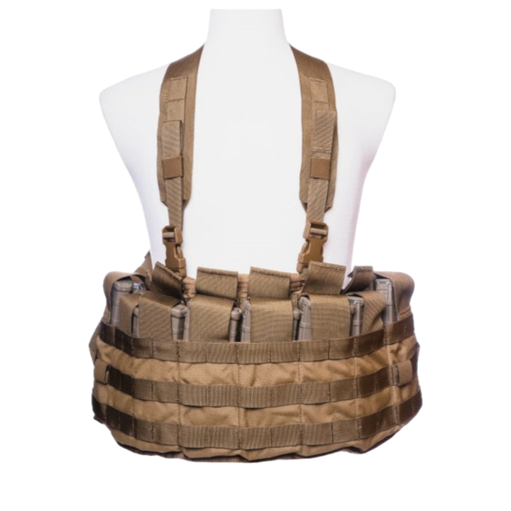 The Unissued US Marine Corps TAP Chest Rig Kit by Six Gun Surplus is showcased on a white mannequin torso in its brown variant. This chest rig includes multiple MOLLE pouches and adjustable straps, meticulously designed to hold accessories and gear securely. Constructed from durable, rugged materials, it is perfect for rigorous outdoor or tactical activities.